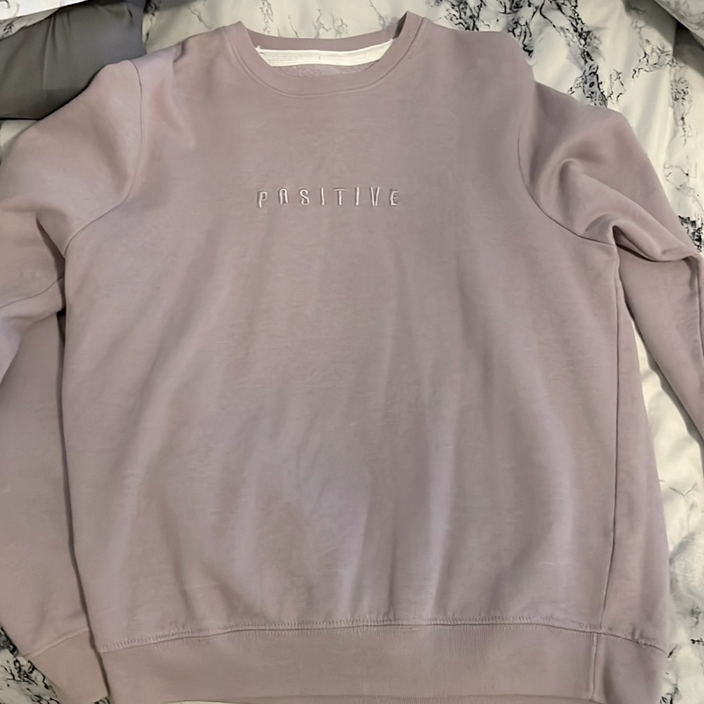 sweatshirt from San Francisco size medium purple that says “positive”